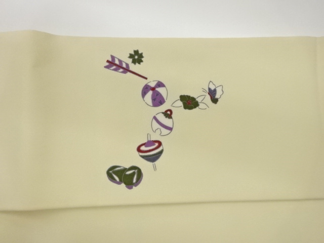  玩具・草花・蝶模様名古屋帯